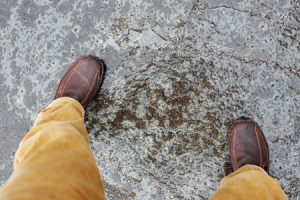 Person standing on an icy pathway