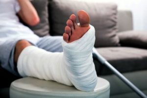 Worker recovering with an injured foot