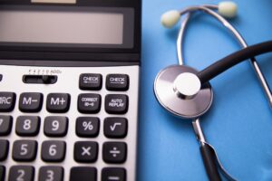 calculator with stethoscope depicting epilepsy misdiagnosis compensation calculator 