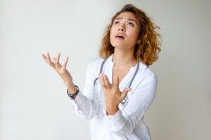 Female Healthcare Professional Looking Distressed. 