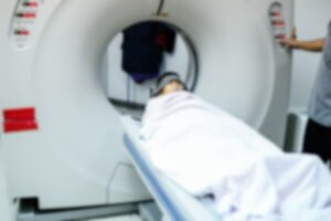 A patient receiving an MRI scan as part of their cancer diagnosis.