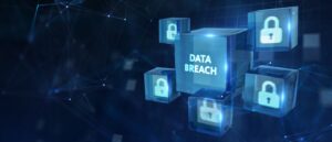 The words data breach sit on a bright blue cube surrounded by illustrations of padlocks