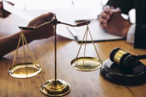 A solicitor and client discussing an accident at work claim.