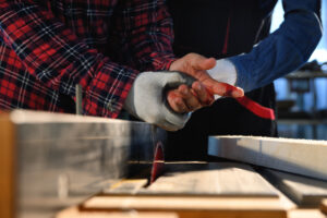 A man has bandaged his injured hand up from his accident at work 