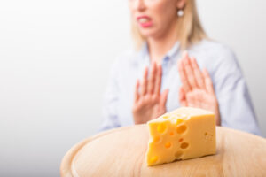 A person has hand an allergic reaction on their hands.