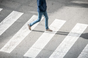 A pedestrian crosses the road.