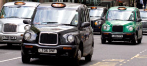 4 taxis on the road.