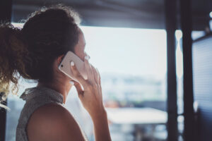 A woman talks on her mobile phone.