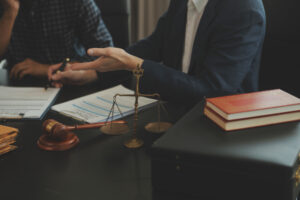 A solicitor discussing car accident victims rights with their client