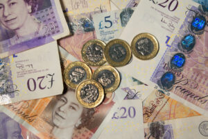 Overhead shot of banknotes and coins