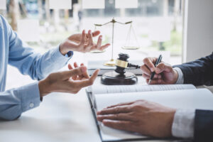 A solicitor helps a client with claiming criminal injury compensation through the criminal injuries compensation scheme